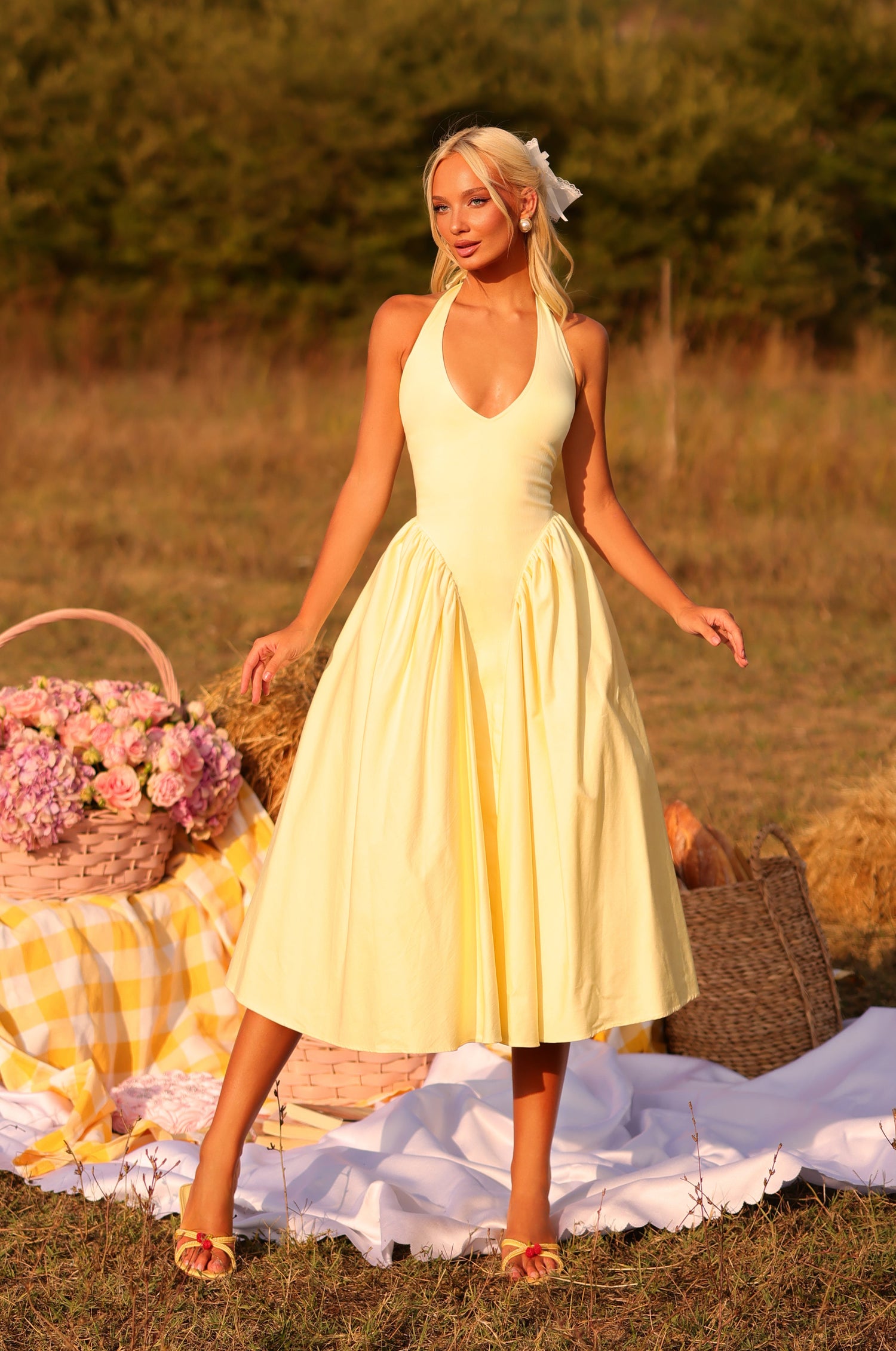 Buttercream Yellow halter midi dress with fitted waist 