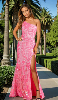Woman wearing a pink one-shoulder dress with a high slit in an outdoor setting.
