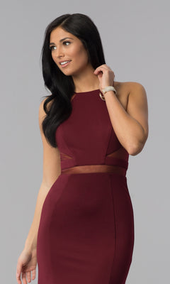 A woman with long dark hair models the Illusion-Cut-Out High-Neck Long Prom Dress 8054, a sleeveless burgundy gown, against a plain gray background.