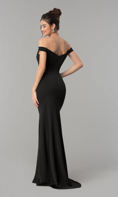 A woman models the Simple Off-the-Shoulder Long Formal Prom Dress 8160 in black, standing with her back to the camera and looking over her shoulder against a plain gray background.