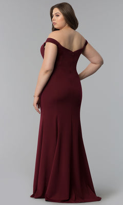 A woman models the Simple Off-the-Shoulder Long Formal Prom Dress 8160 in floor-length burgundy, standing and looking over her shoulder against a plain gray background.