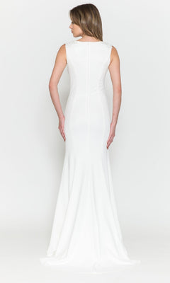 A woman stands facing away, wearing the High-Neck Simple Long Jersey Prom Dress 8566, a sleeveless, floor-length gown with a fitted bodice and slight train.