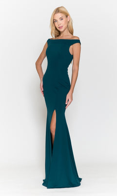 A woman wears the Off-the-Shoulder Classic Long Prom Dress 8724 in emerald, featuring a fitted silhouette and thigh-high slit, standing against a plain white background.