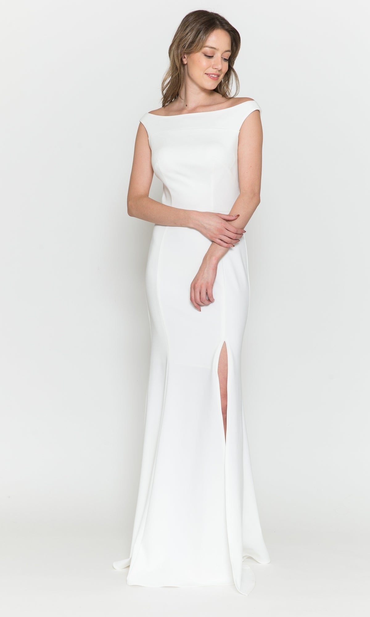 A woman models the Off-the-Shoulder Classic Long Prom Dress 8724 in Off White, featuring a thigh-high slit, against a plain white background.