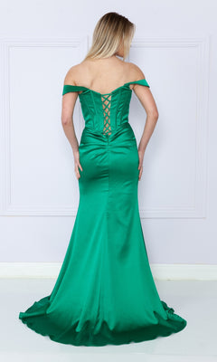 Woman in the Off-the-Shoulder Long Corset Prom Dress 9024, featuring a lace-up back, stands against a light wall, facing away from the camera.
