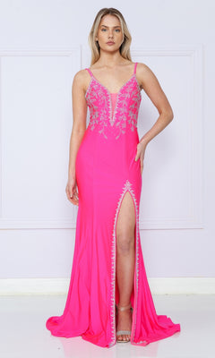 A woman wears the Backless Long Jersey Prom Dress: Poly USA 9120, a bright pink gown with silver beading, deep V neckline, and thigh-high slit, standing against a light background.