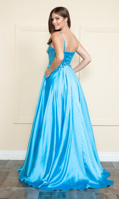 A woman wearing the Sheer-Corset Long Satin Prom Dress (Poly USA 9126) in shiny turquoise, featuring thin straps and an A-line silhouette, stands looking over her shoulder against a light-colored wall.