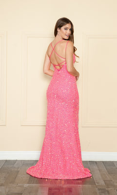 A woman stands on a wood floor facing away, wearing the Open-Back Long Sequin-Velvet Prom Dress 9158 in bright pink, featuring a strappy open back, floor-length design, and sparkling sequin embellishments.