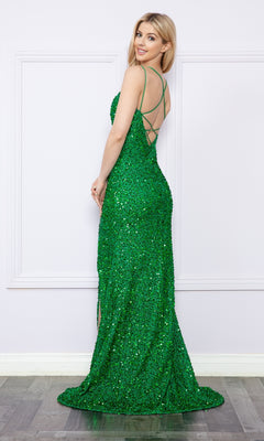 A woman in the Open-Back Long Sequin-Velvet Prom Dress 9158, featuring thin straps and an open back, stands sideways in a minimalist room.