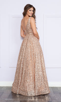 A woman in a floor-length, sleeveless Long Black Sequin A-Line Prom Dress 9168 stands with her back to the camera, looking over her shoulder and smiling.