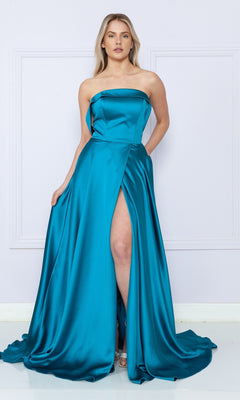 A woman models a teal Strapless Long A-Line Prom Dress with Pockets, featuring a thigh-high side slit and lace-up back, against a plain light-colored background.