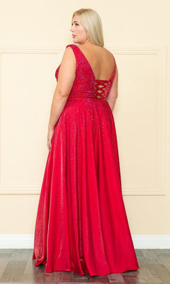 A woman wearing the Embellished Plus-Size Long V-Neck Prom Dress W1110—a sleeveless, floor-length red gown with glitter accents and a lace-up back—stands indoors facing away from the camera.