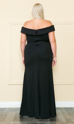 A woman with long blonde hair is seen from behind wearing the Off-the-Shoulder Plus-Size Long Prom Dress W1118, a floor-length formal gown, as she stands by a light wall and wood-patterned floor.