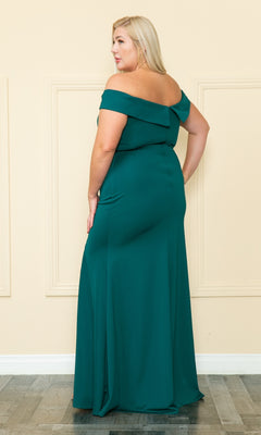 A woman stands indoors, facing slightly away from the camera, wearing the Off-the-Shoulder Plus-Size Long Prom Dress W1118 in green.