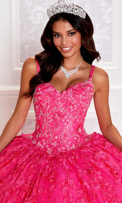 Wearing the Glow-in-the-Dark Princesa Quinceañera Dress PR12261 and a tiara, a person smiles at the camera indoors.