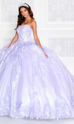 A woman wears the Strapless Princesa PR12265 Quince Dress with Train, featuring lavender floral embroidery and a tiara, standing before a white ornate wall.