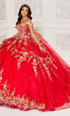 A young woman in the Quinceanera Dress PR30119 By Princesa, featuring red fabric and gold embroidery with an off-the-shoulder design and tiara, stands in an ornate white-walled room.
