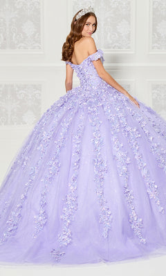 A woman wearing the Princesa PR30120 light purple off-the-shoulder quinceanera dress with 3D floral lace and a tiara stands in front of an ornate white wall, facing slightly away.