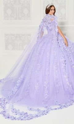 A woman in the Princesa PR30120 lavender floral tulle quinceanera dress with 3D flowers and a matching long cape stands in an elegant white room.