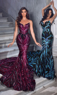 Two women stand on marble stairs wearing the Portia and Scarlett Long Prom Dress PS22538—strapless mermaid gowns with sweetheart bodices and glittering sequin leaf patterns, one in red/black, the other in blue/black.