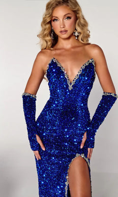 A woman poses against a plain background in the Long Prom Dress PS23680 by Portia and Scarlett, a deep blue strapless sequin gown with matching gloves, a thigh-high slit, and decorative trim along the neckline for elegance.