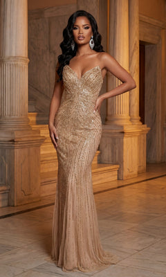 A woman stands in an ornate hall wearing the Portia and Scarlett PS25331 long formal dress in champagne, featuring a strapless design with intricate beading, paired with long earrings.