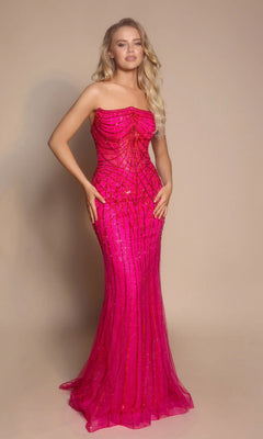 A woman poses against a beige background in the Portia and Scarlett PS26130—an elegant, strapless fuchsia long formal dress featuring a floor-length, form-fitting silhouette with detailed beading.