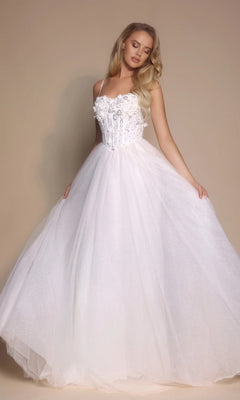 A woman in the Portia and Scarlett PS26146 Glitter Prom Ball Gown in ivory, with a boned-corset bodice and full skirt, stands against a neutral background.