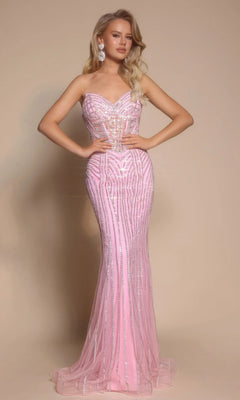 A woman poses against a beige background wearing the Portia and Scarlett PS26156 long formal dress in Silver/Pink, featuring a strapless sweetheart neckline, form-fitting silhouette, silver sequin details, and a sheer corset bodice.