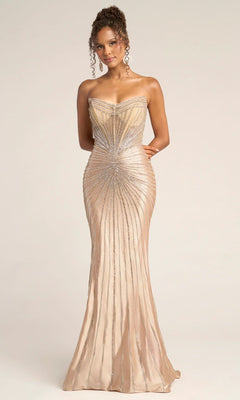 A woman wearing the Portia and Scarlett PS26250 long formal dress in champagne, detailed with strapless design and metallic silver embellishments in a radiating pattern.