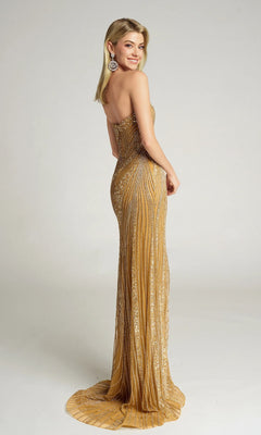 A woman stands smiling over her shoulder in the Portia and Scarlett PS26410C, a strapless, floor-length gold sequin gown featuring a fitted silhouette, against a plain backdrop.