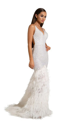 A woman wears the Long Formal Dress PS6826 by Portia and Scarlett—a white mermaid gown with a fitted, beaded bodice, feather-trimmed skirt, and chic V-neckline—posed against a plain white background.