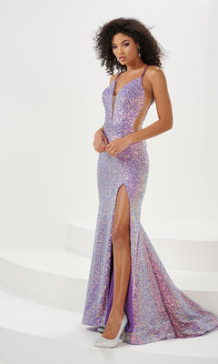 A woman wearing the Long Prom Dress 14178 by Panoply, a sparkly lavender sequin gown with a thigh-high slit and deep neckline, stands on a white background.