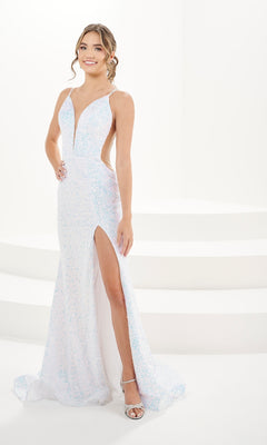 A woman models the Long Prom Dress 14178 by Panoply—a fitted, sleeveless sequin gown in light blue with a deep V-neckline, side cutouts, and a thigh-high slit—against a white background.