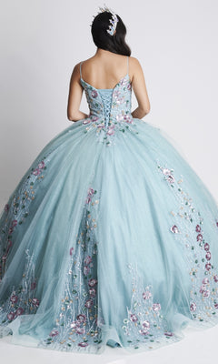 A woman faces away, displaying the intricate floral embroidery and corset back of the Nina Canacci Q105 long Quinceanera dress in light blue, her gown and headpiece adorned with elegant floral accents.