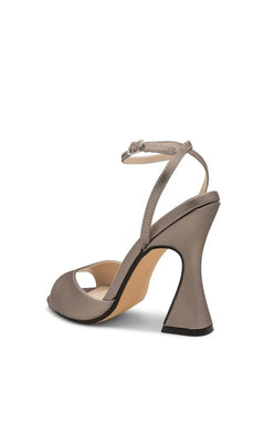 Quinn Champagne Prom Shoes: Touch Ups 4699 are champagne-colored open-toe ankle strap shoes featuring a modern, flared sculpted heel.