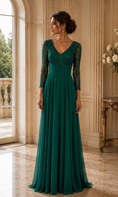 A woman in a Rina Di Montella R106 evergreen floor-length formal dress featuring a V-neckline and long lace sleeves.