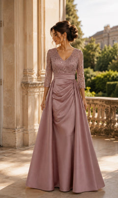 A dusty rose Rina Di Montella R108 A-line formal dress featuring a beaded lace bodice with three-quarter length sleeves and a draped skirt.