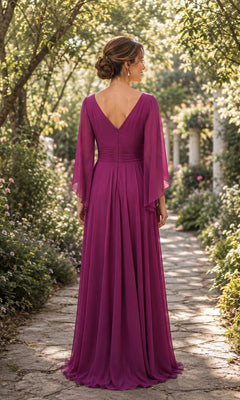 A woman stands on a stone path wearing a floor-length magenta Flutter Sleeve Chiffon Long Formal Dress: Rina Di Montella R111, featuring a V-neck back and flowing flutter sleeves.