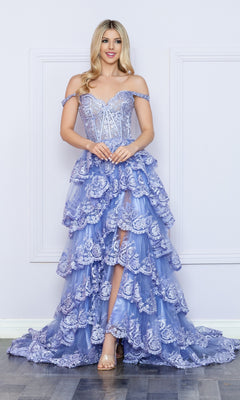 A woman in the Nox Anabel Off-the-Shoulder Lace Prom Dress R1299 stands by a white paneled wall, wearing nude heels and her long hair styled in loose waves.