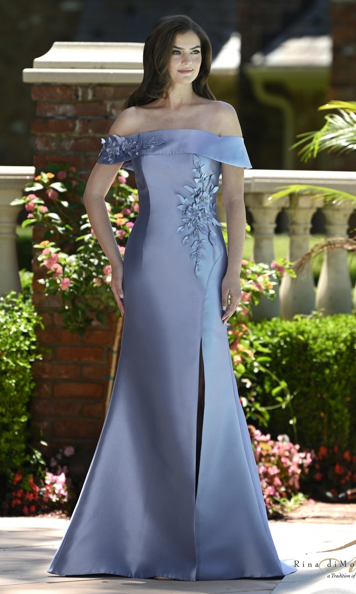 Sky blue off-the-shoulder mermaid Folded Off-the-Shoulder Mermaid Formal Dress: Rina Di Montella RD3612 with floral appliqué and a front thigh-high slit.