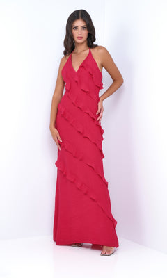 Woman in the V-Neck Halter Ruffled Long Prom Dress: Remi by Velvi—sleeveless, floor-length with diagonal ruffles—stands against a plain white background.
