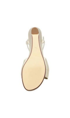 Bottom view of a Touch Ups 4729 Rose Champagne Wedge Prom Shoe, featuring a rose gold wedge heel and an ankle strap.