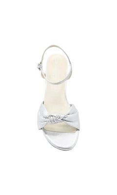 Rose Silver Wedge Prom Shoes: Touch Ups 4728 silver wedge sandal with an ankle strap and a knotted detail across the toe.