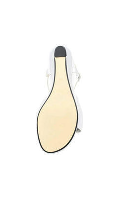 Underside view of Rose Silver Wedge Prom Shoes: Touch Ups 4728 showing the flat sole and heel tap.