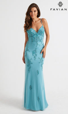 A woman models the Strappy-Back Long Light Pink Prom Dress by Faviana, featuring thin straps and bead accents, against a plain white background with the "FAVIAN" logo in the top right corner.