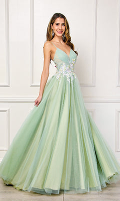 A woman poses with a smile and hand on her hip, wearing the Amelia Couture SU088 Long Pastel Prom Ball Gown—a light green, A-line formal dress with floral embroidery at the waist—against a white paneled wall.