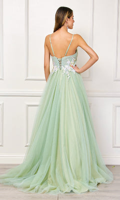 A woman faces away, wearing the Amelia Couture SU088 long pastel prom ball gown with thin straps, a lace-up back, and delicate floral embroidery at the waist.