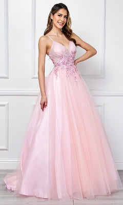 A woman stands indoors wearing the Amelia Couture SU088 Long Pastel Prom Ball Gown, a floor-length, a-line formal dress in light pink with floral embroidery and a fitted bodice.