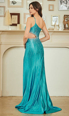 A woman wearing the Amelia Couture SU097, a teal, floor-length prom dress with a high leg slit and cutout back, stands by a fireplace adorned with small framed art and ornaments.